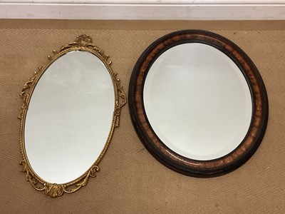 Lot 736 - An oval mirror with gilt frame, height 54 x...