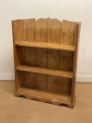 Lot 701 - A pine open bookcase with two shelves, height...