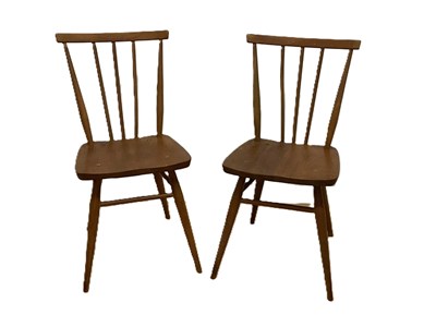Lot 753 - ERCOL; a pair of model 391 stickback dining...