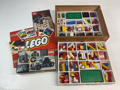 Lot 116 - LEGO; a 1970s wooden box of Lego, together...