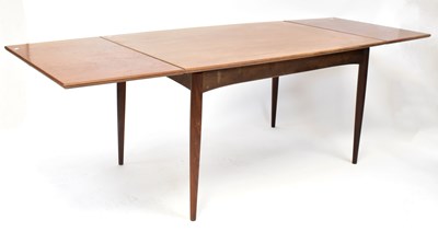 Lot 56a - A mid century teak extending dining table, 74...