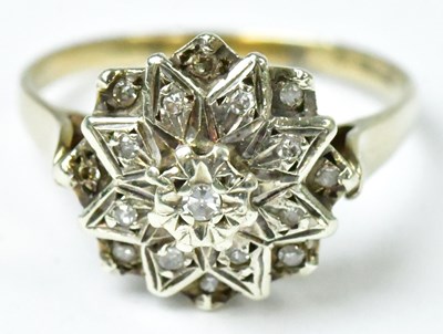 Lot 755 - A 9ct yellow gold star-shaped ring set with...