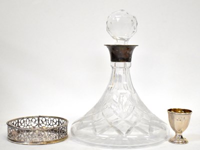 Lot 551 - A cut glass ships decanter with hallmarked...