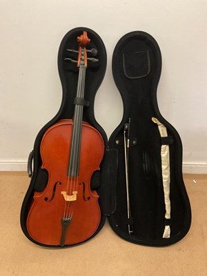 Lot 164 - STAGG; a cello, with bows in a hard case.