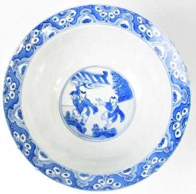 Lot 251 - A Chinese blue and white bowl, painted with...