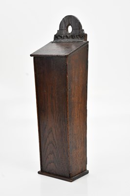 Lot 512 - An 18th century oak candle box, with leather...