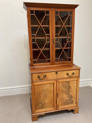 Lot 85 - A 19th century style mahogany bookcase, the...