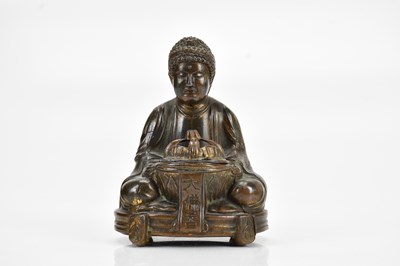 Lot 1182 - An early to mid 20th century Japanese bronzed...
