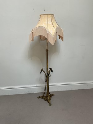 Lot 571 - A good Victorian brass adjustable standard...