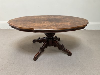 Lot 98 - A Victorian style walnut coffee table with...