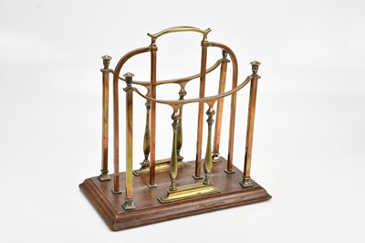 Lot 589 - An Arts and Crafts brass and oak two division...