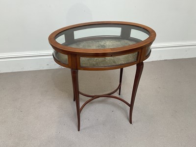 Lot 1190 - An Edwardian inlaid mahogany oval bijouterie...