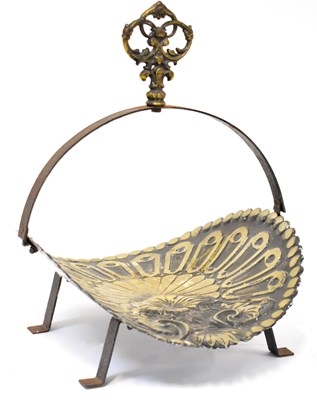 Lot 530 - A cast metal log basket with scroll and leaf...