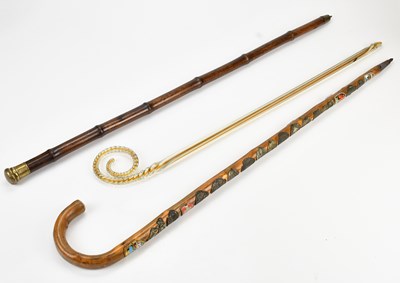 Lot 2052 - An early 20th century bamboo walking cane with...