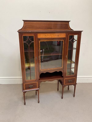 Lot 1189 - An Edwardian inlaid mahogany display cabinet...
