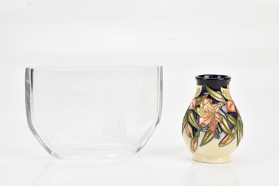 Lot 1499 - MOORCROFT; a squat baluster shaped vase,...