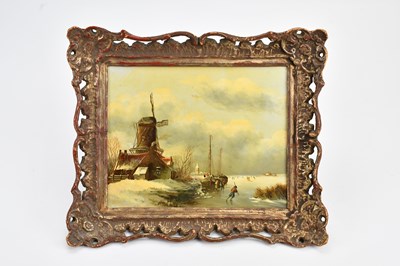 Lot 1063 - DUTCH SCHOOL; an oil on board winter scene...
