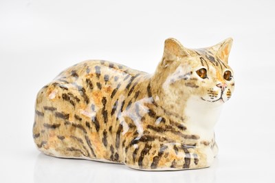 Lot 1351 - WINSTANLEY; a large ceramic model of a cat...
