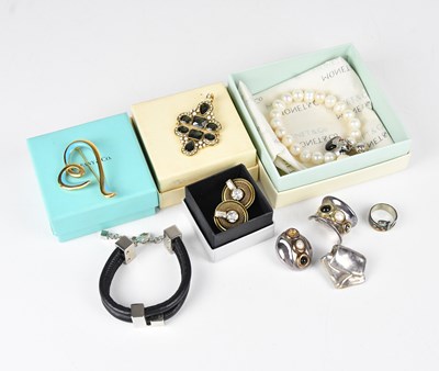 Lot 1441 - LOEWE; a heavy black leather and silver tone...