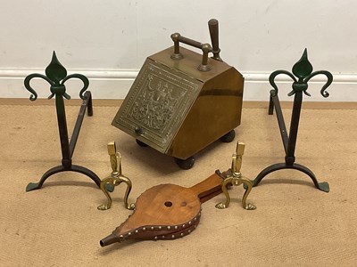 Lot 647 - A group of fireside metalware, comprising two...
