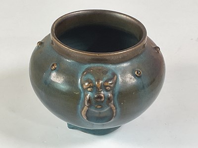 Lot 12 - A Chinese Jun porcelain pot with relief detail...