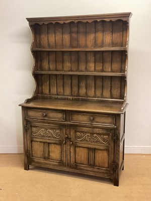 Lot 787 - An oak dresser with two drawers over two...