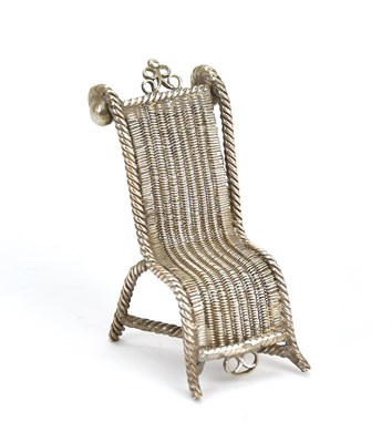 Lot 169 - A Dutch white metal miniature chair with...
