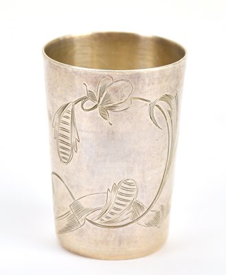 Lot 171 - A Russian silver tot cup, engraved with floral...