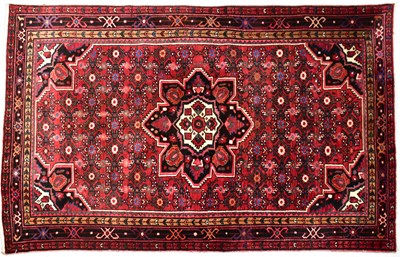 Lot 80 - A Persian wool Hamadan rug, with central...