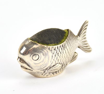 Lot 180 - SAMPSON MORDAN; a novelty pin cushion formed...