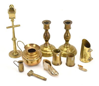 Lot 2105 - A collection of miniature brass and base metal...