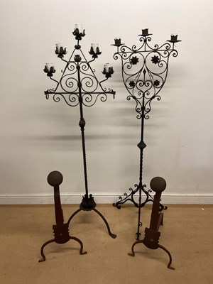 Lot 642 - Two ornate metal worked candle holders, taller...