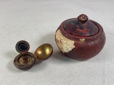 Lot 40 - A brass inkwell in the form of a leather...