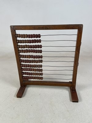 Lot 41 - An early 19th century wooden abacus, height...