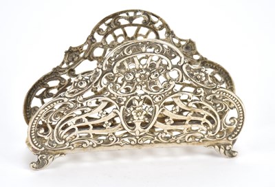 Lot 203 - A Continental white metal desk rack, tests as...