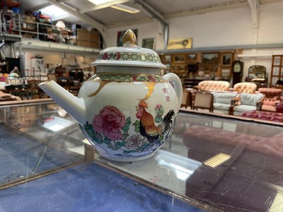Lot 246 - A Chinese Chenlung Famille Rose teapot painted...