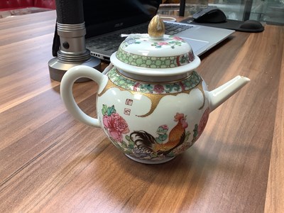 Lot 246 - A Chinese Chenlung Famille Rose teapot painted...