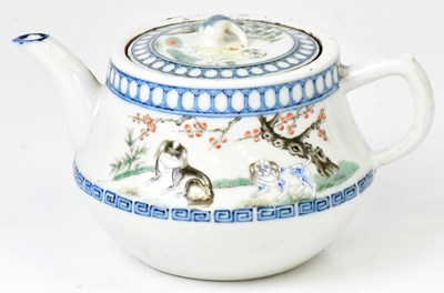 Lot 183 - An early 20th century Chinese teapot of squat...