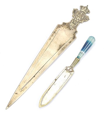Lot 214 - A Continental white metal bookmark with crown...