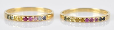 Lot 513 - Two 14ct yellow gold half eternity rings, each...