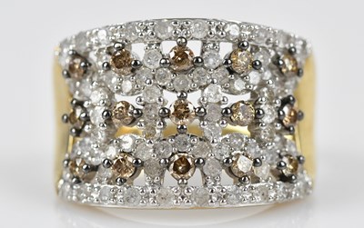 Lot 552 - A 9ct yellow gold diamond set plaque ring, set...