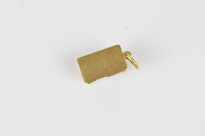 Lot 29 - A yellow metal charm of classical ruins,...