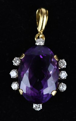 Lot 231 - A good diamond and amethyst pendant, the oval...