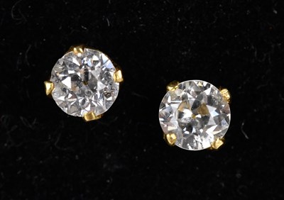 Lot 171 - A pair of diamond set ear studs in yellow...