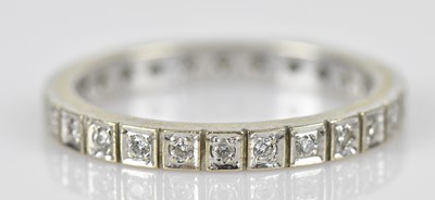 Lot 553 - A diamond set full eternity ring, set with...