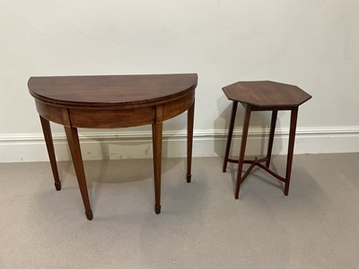 Lot 2053 - An early 20th century mahogany demi-lune...