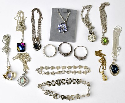 Lot 877 - A group of jewellery comprising a pendant set...