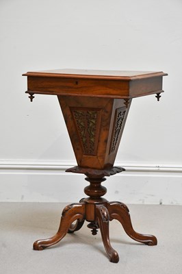 Lot 2043 - A Victorian walnut sewing table with fitted...