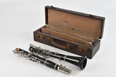 Lot 42 - BOOSEY & HAWKES; a '77' ebonised clarinet,...