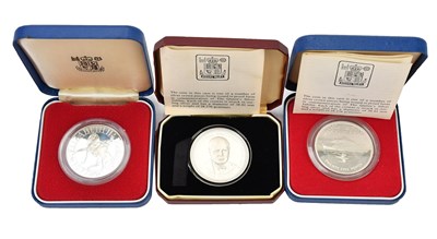 Lot 633 - A group of three silver proof coins,...